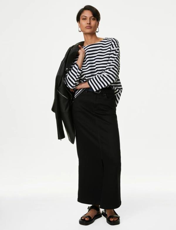 woman wearing marks and spencer autograph denim maxi skirt